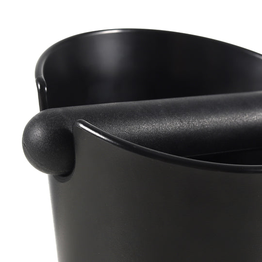 Close-up of the silicone knock bar on the VEVOK CHEF Coffee Knock Box, designed for durability and quiet performance. The silicone material ensures that the espresso handle is protected while knocking out coffee grounds.