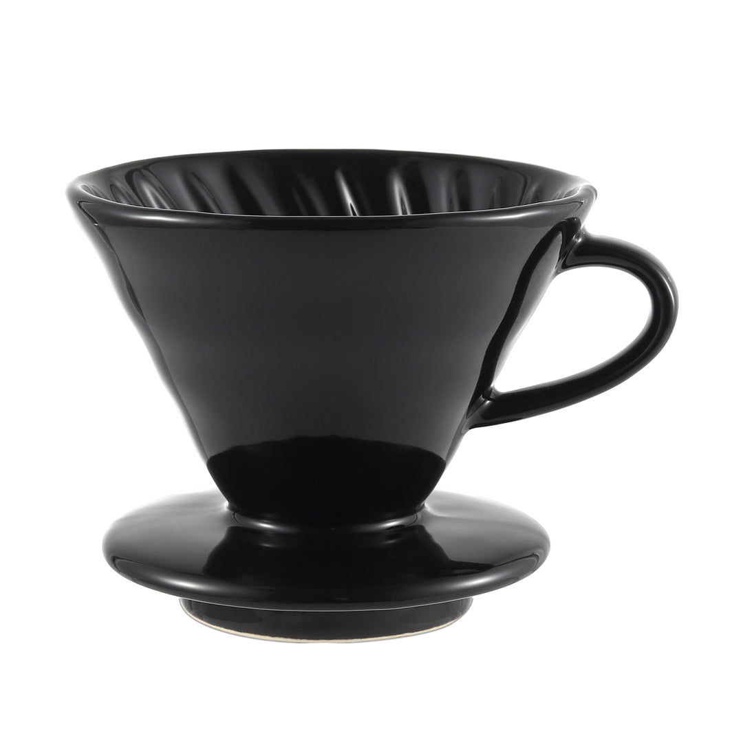 The NERA Ceramic V-Shaped Pour Over Coffee Dripper in black, displayed on a white background. This stylish ceramic dripper features a sleek, minimalist design, perfect for brewing a flavorful pour-over coffee. VEVOK CHEF's premium craftsmanship ensures a high-quality brewing experience.