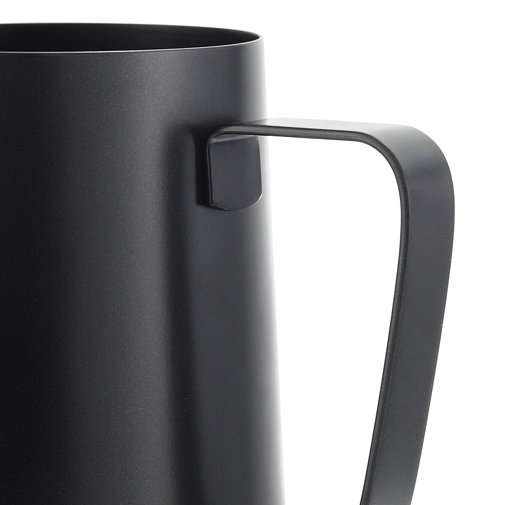 Close-up of the ergonomic handle of the VEVOK CHEF LARA Milk Frothing Pitcher, designed for ease of use while frothing milk, ensuring a secure and comfortable grip for precise pouring.