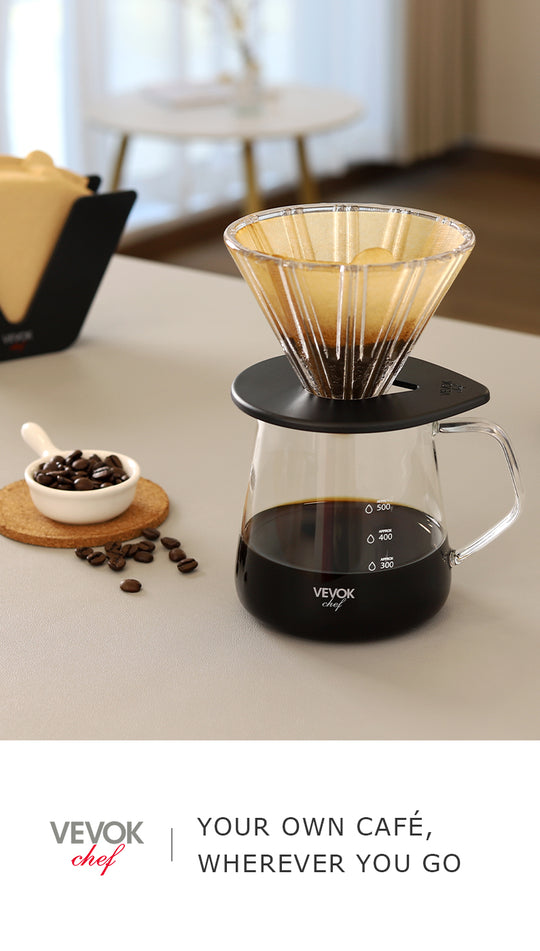 VEVOK CHEF Pour Over Coffee Maker Set on a grey table with coffee powder, beans, a coaster, and filter holder. The server contains freshly brewed coffee, bringing café-quality coffee to your home.