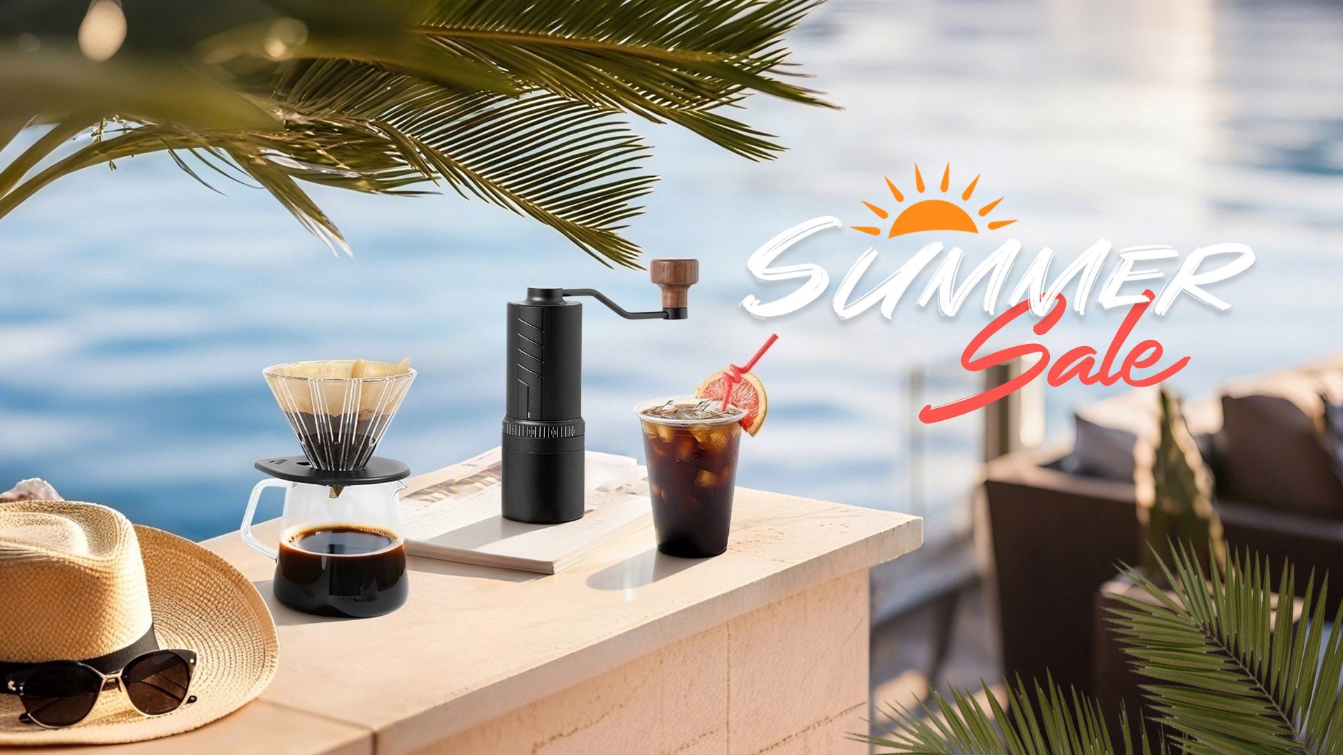 Bright summer balcony setup with O20 coffee grinder, pour-over set, iced coffee, sunglasses, books, and summer props creating a refreshing holiday mood.